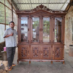 f57cc787 a44a 4154 b750 41b90e3c56a8 300x300 - Lemari Hias Kaca Ukiran Full Kayu Jati